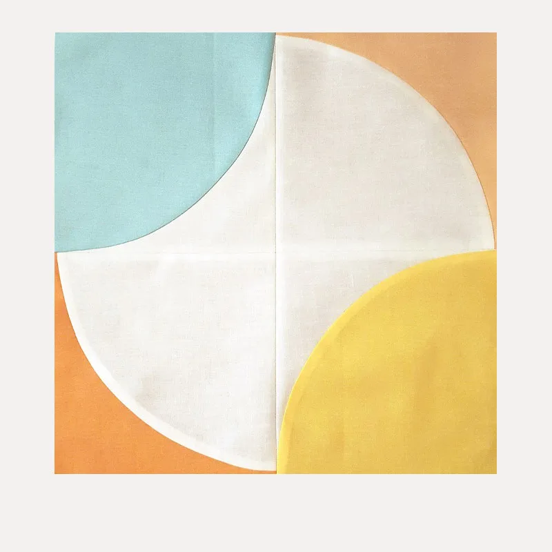 This Fizzy quilt block from Blossom Heart Quilts adds a magical twist to the good-ol drunkard's path quilt block! The unique placement of curves adds an artsy pop to the finished quilt piece.