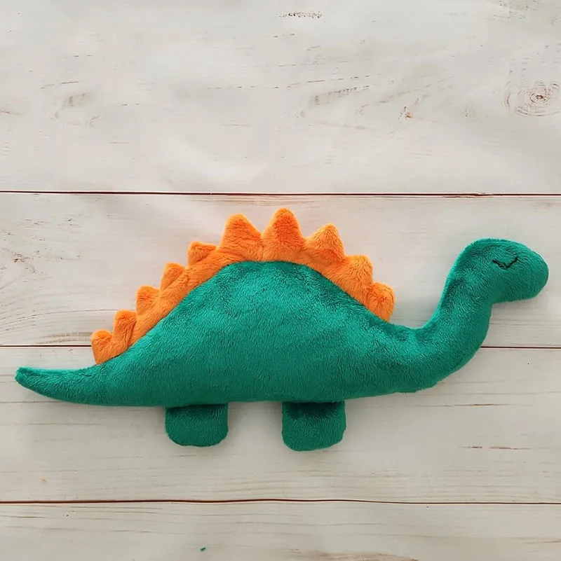 Take a look at this flat dinosaur plushie that's so simple yet charming. It's a great shape for little hands to hold and cuddle with, and even easier to sew. The spikes can be slightly difficult to sew neatly, but the rest is fairly simple, so give it a try!