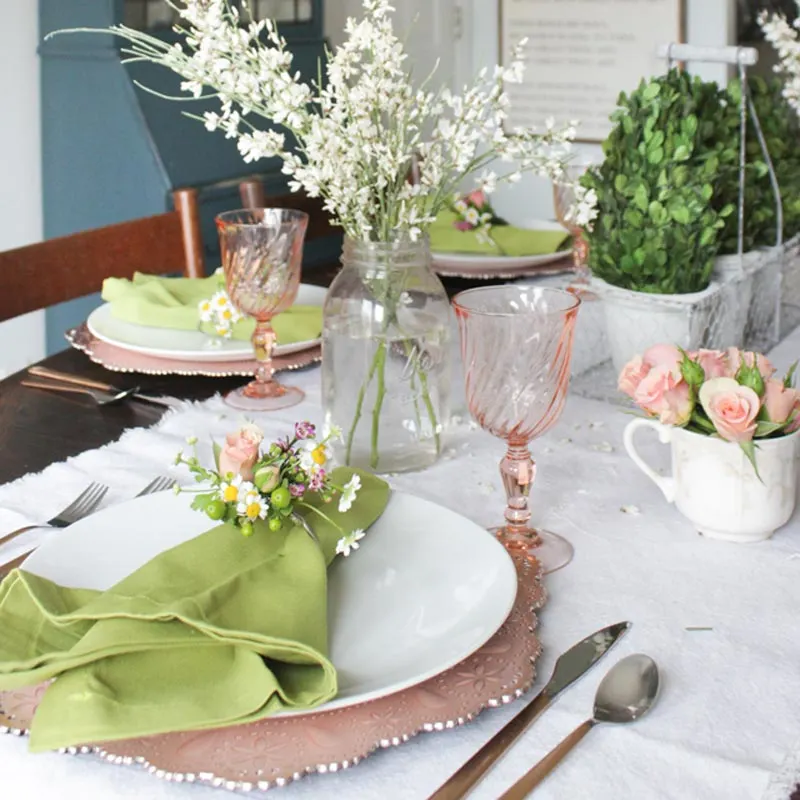 Learn how to craft these floral napkin rings and a spring tablescape following this tutorial by Shades of Blue Interiors. This idea can be used for a brunch, a garden party, baby shower, or even a wedding for when you want to incorporate a floral and whimsical touch.