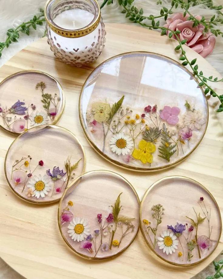 Aren't these beautiful? If you love them as much as we do, click the link below to watch the tutorial. You can instantly make these simple floral resin coasters, and tray sets with only a few hours to spare!
