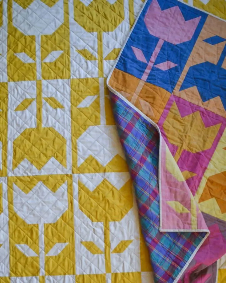 As promised, here are some paid versions you can get your hands on! Check out this elegant Flower Block Quilt Pattern that is fat-quarter friendly! It's catered to advanced beginners, and you'll work with four at a time half square triangles. The quilt also comes in four sizes: wall hanging, baby, throw, and bed.&nbsp;