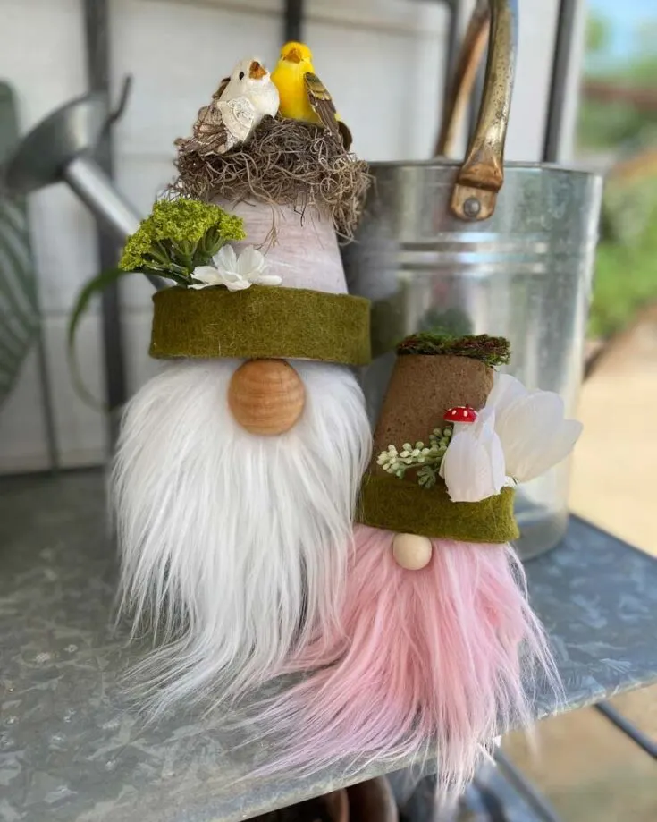 Flower pot gnomes are sure to look great on your patio, looking right at home among your favorite plants. Add some embellishments like flowers, moss, and a little bird to give them even more charm!