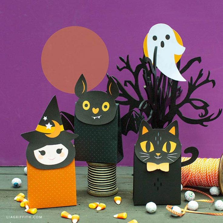 Dress up your treat bags in Halloween costumes with fun patterns like a cat, ghost, bat, and witch! This project is perfect for kids to craft and easy to assemble independently. You only need scissors, glue, and some cardstock paper to start!