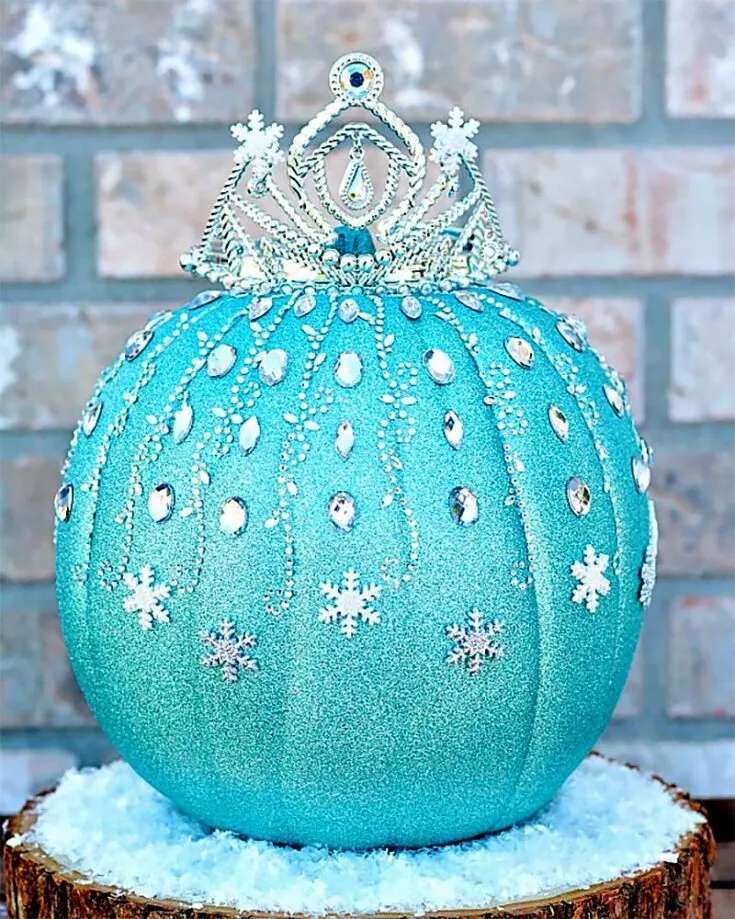 We promised you Disney pumpkin painting ideas, so here you go! This gorgeous Disney Frozen Elsa Pumpkin was made with glitter blast spray paint, rhinestones, and a beautiful tiara.