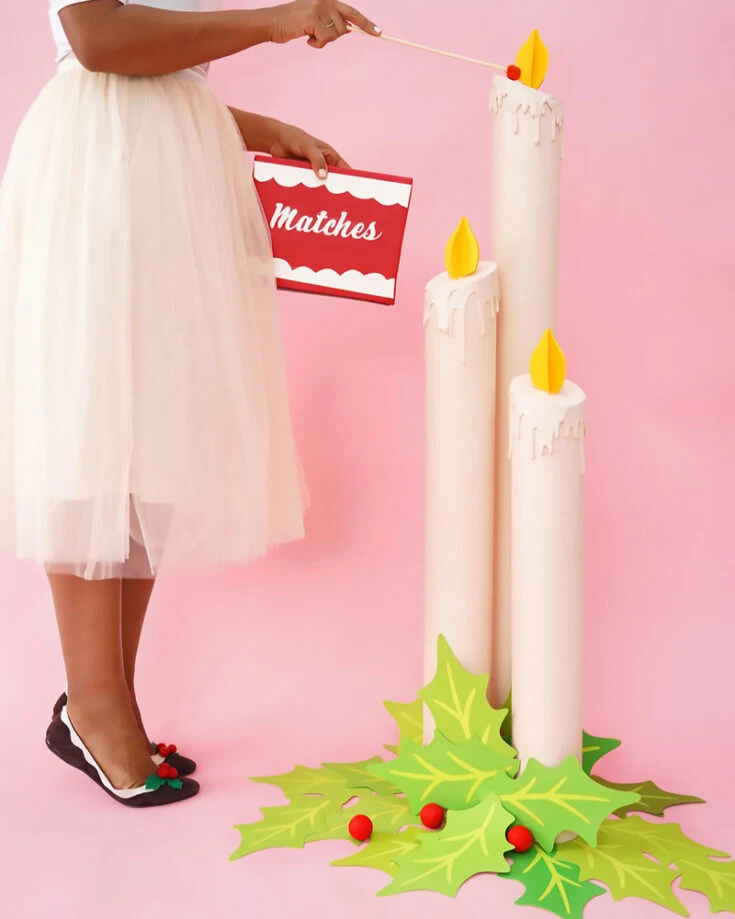 Believe it or not, these Giant Christmas Candles are mainly made of cardboard! They make the perfect paper Christmas decorations using any recycled cardboard that you may have lying around. What a fun way to recycle!