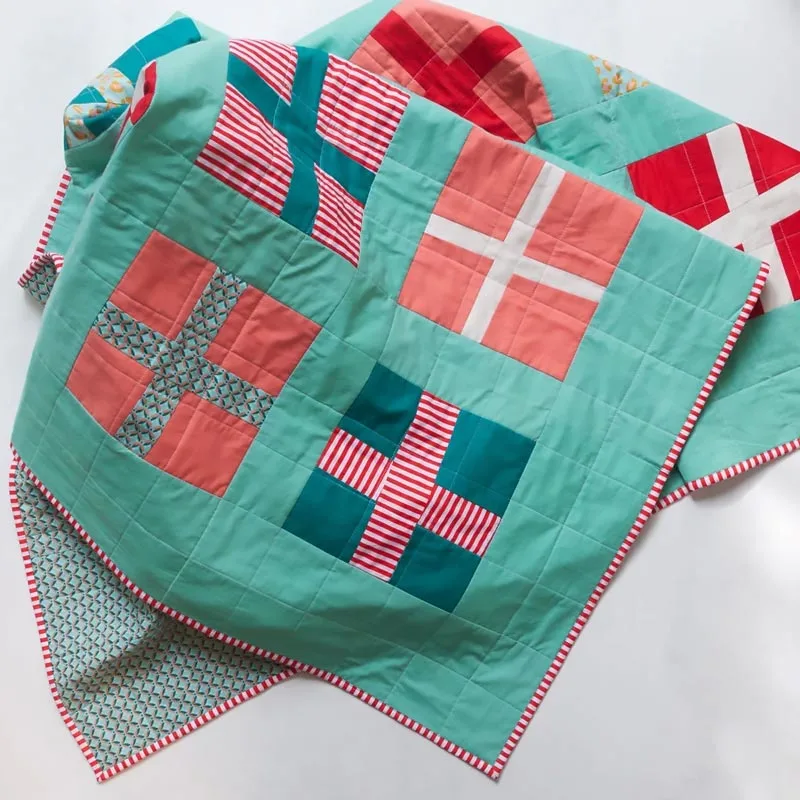 For a reasonable price, you can purchase this beginner quilt project that comes with instructions for 5 different sizes: crib, lap, throw, full, and queen! It's perfect to make around the upcoming holiday season, and this modern Christmas quilt uses a basic improv technique to add quirkiness. It's fat quarter-friendly, so give it a go!&nbsp;
