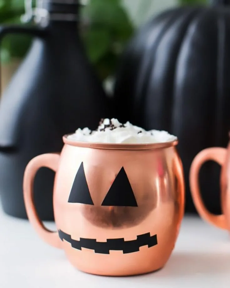 Be immersed in the spirit of Halloween by making pumpkin spice lattes with this adorable mug! It's an excellent tutorial for upcycling your old mugs and elevating them to match the theme of this holiday.