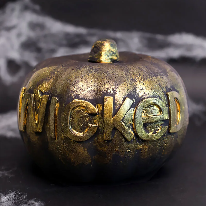 We're back with scary pumpkin painting ideas for Halloween with this black word pumpkin with a weathered metallic glaze. This pumpkin looks like it belongs in a witch's tavern. Follow the tutorial to see how to create this spooky design!