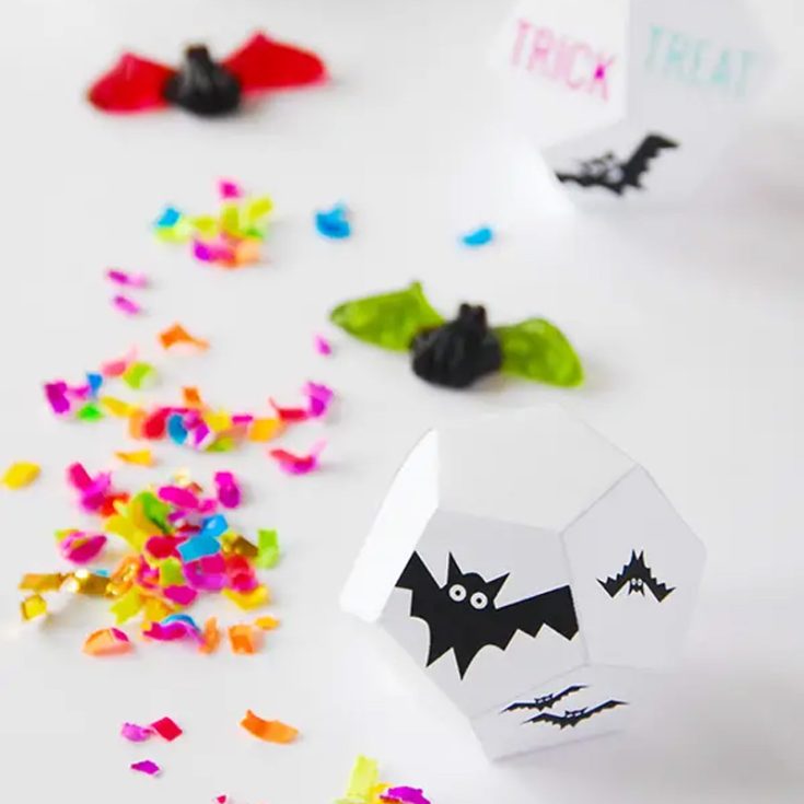 These Halloween treat boxes shaped like hexagon dice are a fun way to hand out treats! Label each side with spooky snippets, or use them to create your Halloween game. They&rsquo;ll add a playful and interactive twist to your celebrations!