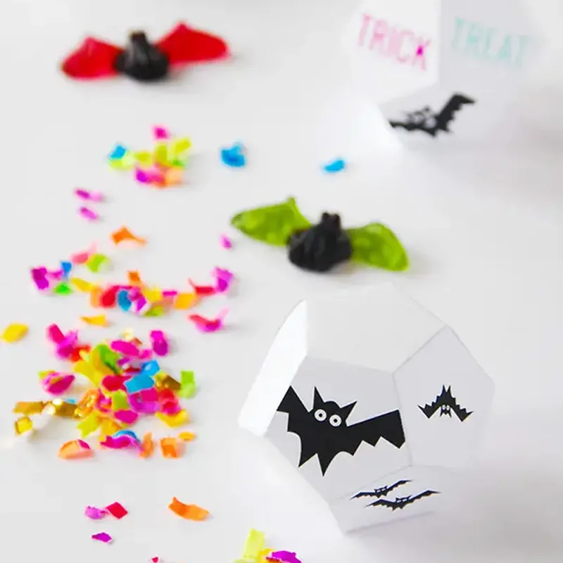 These Halloween treat boxes shaped like hexagon dice are a fun way to hand out treats! Label each side with spooky snippets, or use them to create your Halloween game. They&rsquo;ll add a playful and interactive twist to your celebrations!