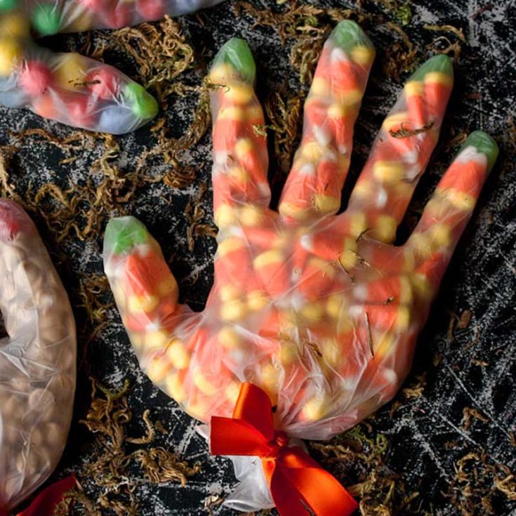 How about making Halloween glove treat bags? Grab some clear, non-latex gloves from the pharmacy (make sure they're powder-free), fill them with candy, and tie them off with a ribbon. It&rsquo;s a fun and easy way to serve up some spooky sweets!