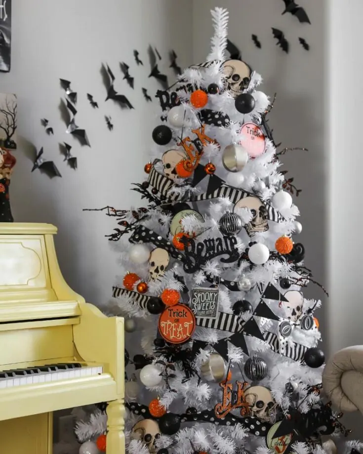 Who said Halloween couldn't have its own tree to celebrate the occasion? Let's break barriers of normalities with this tutorial! Get yourself a beautiful tree and start decorating it with spooky decor and skulls.
