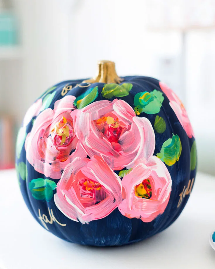 Do you love florals? Do you also love hand painting? Then, this intricate hand-painted floral pumpkin tutorial is the fall project for you!