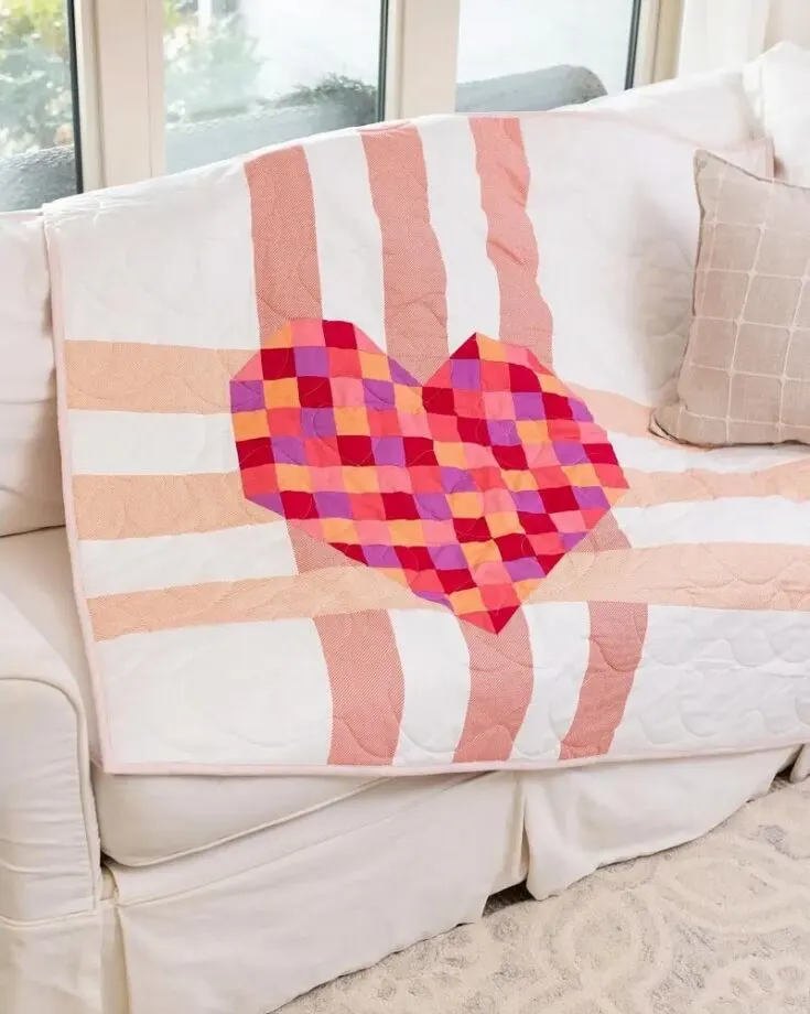 Feast your eyes on this lovely and feminine quilt design you can make for that special someone. Whether you're looking to make a thoughtful gift to your loved ones or to share some love with yourself, this quilt exudes a modern vibe and is simply irresistible. The finished size is 51" x 52".&nbsp;