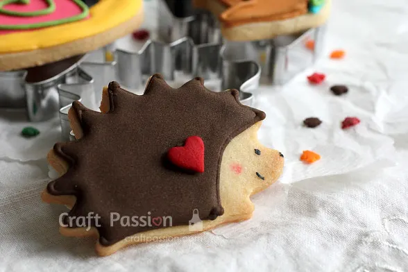 Bake adorable hedgehog, squirrel, & snail-shaped animal cookies and bring them to life with royal icing designs using the piping & flooding method.