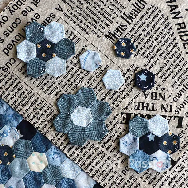 If you wish to sew the Hexagon Flower Quilt Block in the traditional way, here is the English Paper Piecing method. We used mini hexagon templates to make these small hexagon flowers. This is a perfect flower applique for small sewing projects.