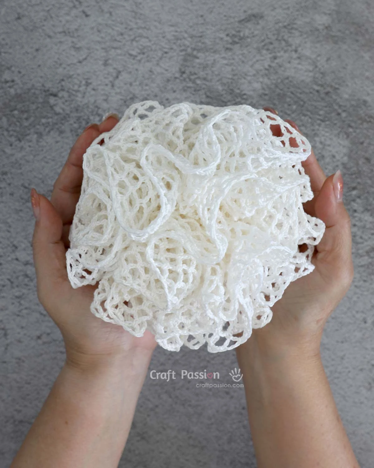 DIY your own shower scrubbie with this easy, beginner-friendly crochet loofah pattern. Great as a washcloth or bath pouf for everyday use or gifts!