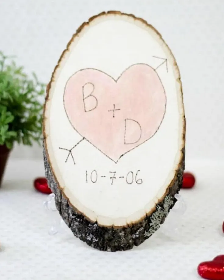Create this romantic gesture by engraving your initials and anniversary date on this wood slab!