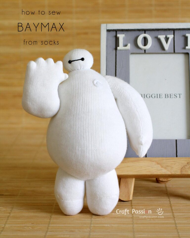 Sew a sock Baymax plush from Big Hero 6! This squishy robot has 2-dot eyes and a white balloon-like body. Free pattern and tutorial included!