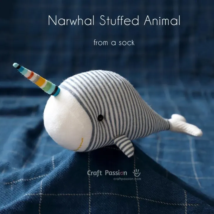 Adorable Sock Narwhal stuffed animal, Nadir, sewed from a sock! Grab the free pattern template & step-by-step Instructions to sew it.