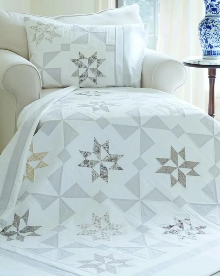 Indulge in the art of quilting with this captivating and easy Stardust Shimmer quilt design with the bonus of a pillow sham pattern. Standing at $6.95, this minimalistic-inspired piece offers an assortment of peaceful scrappy stars and pinwheels framed by beautiful sashing and border. It comes in sizes as follows: Youth (48&rdquo; x 58&rdquo;) Throw (68&rdquo; x 68&rdquo;) Queen (88&rdquo; x 88&rdquo;) King (108&rdquo; x 108&rdquo;)