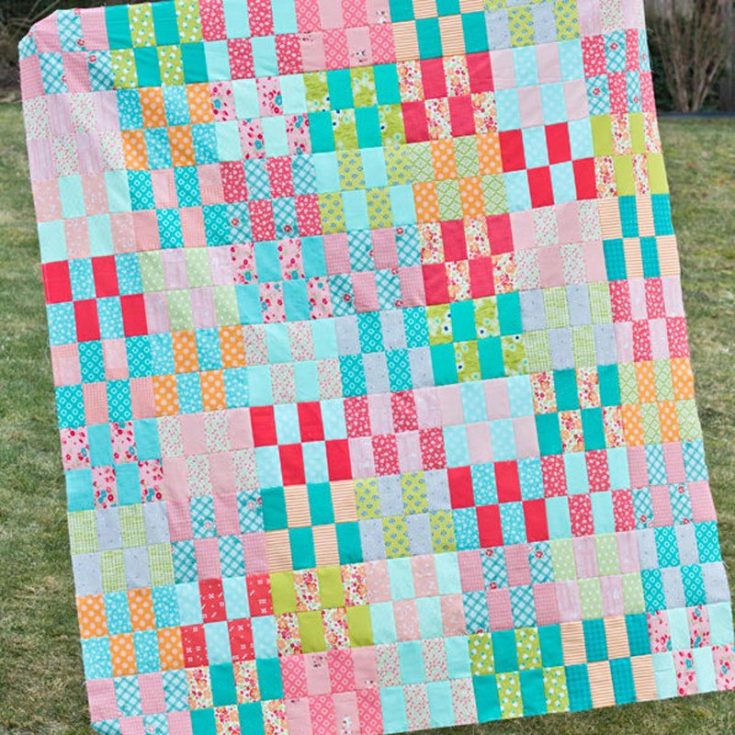 Elevate your bedroom decor with this jelly roll quilt design! It will add such a fun vibe to your space and is so visually alluring. Due to its large blocks, this pattern makes for a great large bed quilt! So grab all the tools and fabric you will need, don&rsquo;t forget the most critical piece, your jelly roll bundles, and sew your way into this jelly strip buster quilt pattern. Size: 56&rdquo; x 63&rdquo;, or 56&rdquo; x 64&rdquo; (if laying the blocks on their side)