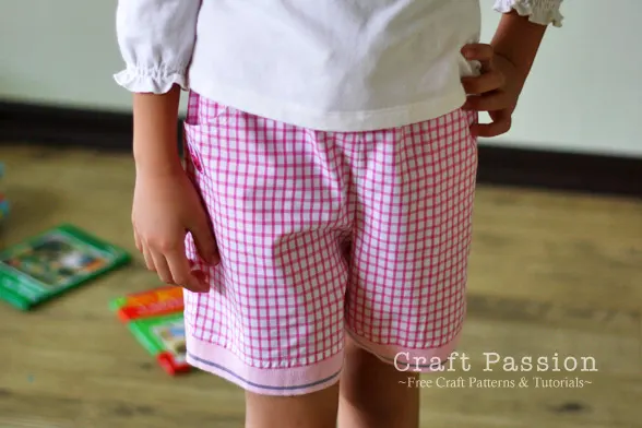 Get the free sewing pattern for kid shorts (with pockets) of age around 7 year-old and learn how to sew it in detail instructions that come with photos.