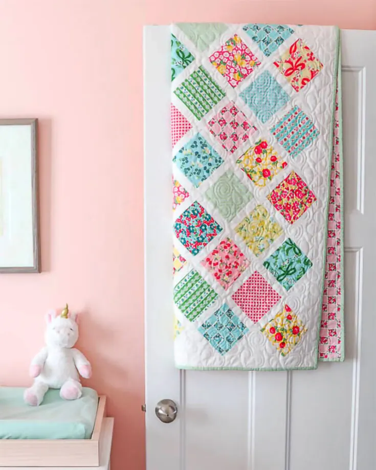 Here's a magnificent lattice baby quilt that finishes up to 41" x 49". With some pastel-hued 5" squares and sashing fabric, you could make this a sweet addition to the baby's room.