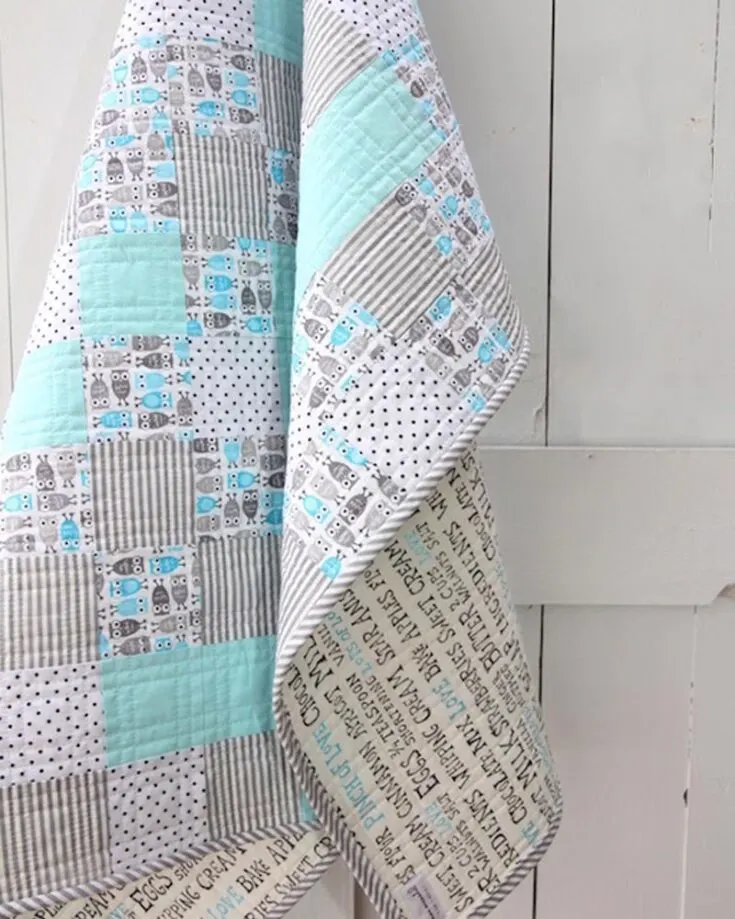 Looking for more simple baby quilts to make? This Little Owl baby quilt is perfect for beginners wanting to venture into this project for the first time. It is made from a combination of cute motif fabrics, solid and little dots, and stripes. The finished size is 47&rdquo; x 35 &frac12;&rdquo;.