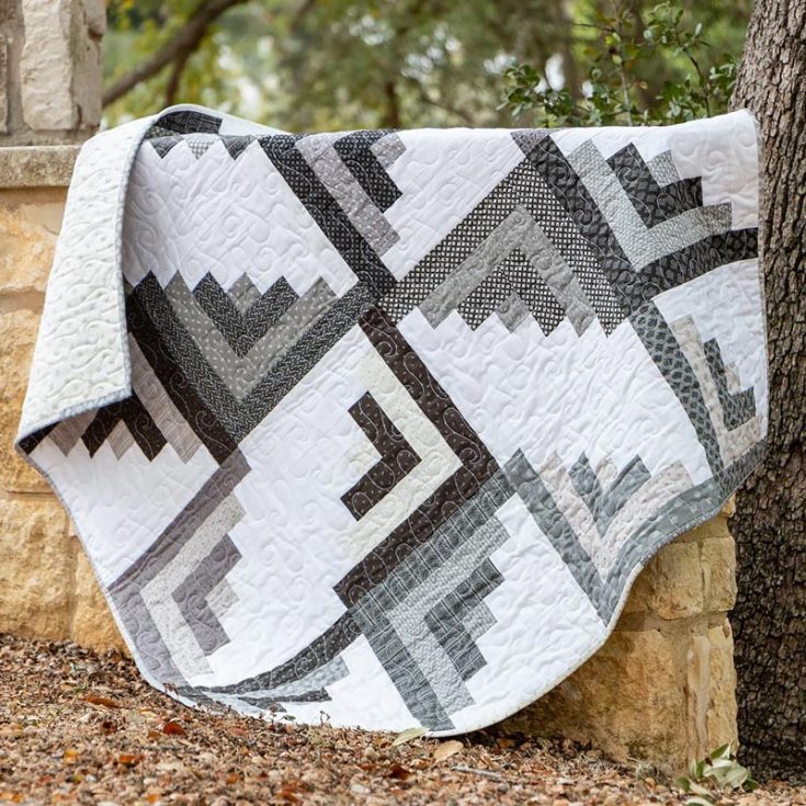 Are you craving a cabin getaway this Winter? Then, you must prepare a quilt set to make your stay all the more relaxing. Try quilting this blissful design that is easy on the eyes, and it just looks so comfy to snuggle in. Though it can be a bit challenging since it uses the foundation paper piecing technique, the video tutorial will guide you in making this gorgeous pattern. Size: 48.5" x 48.5" (can be sized up or down by adding or subtracting blocks)