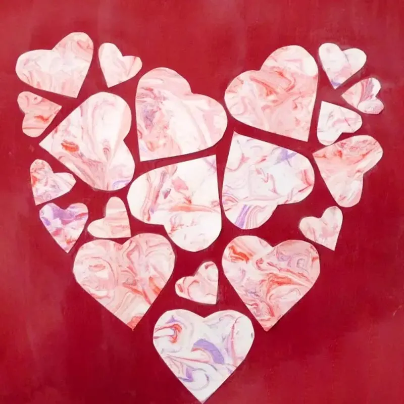 Let your kid's creativity unfold with this fantastic marbled heart collage! It could be made as a painting on canvas or a card. With just paint and white shaving cream, you can make your version of this gorgeous design to spread joy on Mother&rsquo;s Day.