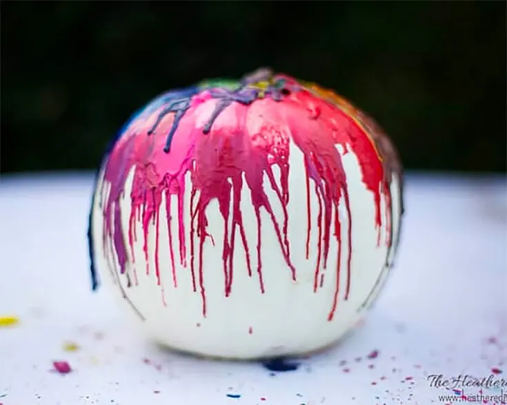 Have your kids or yourself outgrown crayons? Don't let them collect dust in a box, instead, use them to create this chaotic artistic mess on your pumpkins! As they say, there is beauty in chaos indeed.