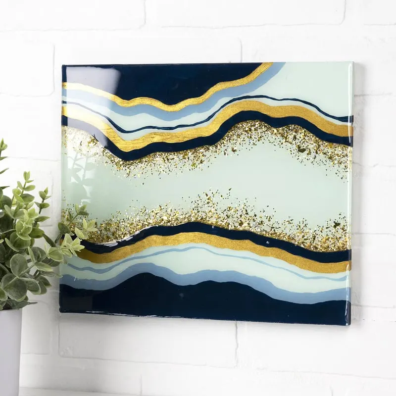 Learn to make this Mod Podge Geode wood sign as home decor! They're irresistible and would make for pretty gifts to a special someone.