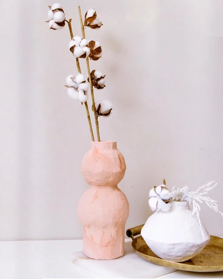 Making one of these beautiful paper mache vases is a fun way to spend a summer afternoon. Thereafter, exhibit them with pride as your own creation!