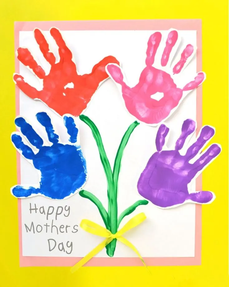 Turn those tiny hands into a blooming work of art (pun intended!) with this adorable Mother&rsquo;s Day handprint art flower card design! This craft is perfect for kids to make; they can create vibrant flower petals using handprints and paint.