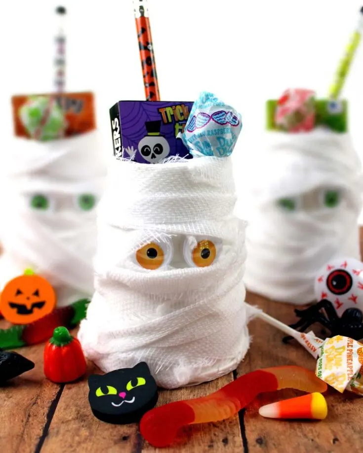 Mummy Halloween Treat Cups are a playful and spooky craft that&rsquo;s sure to delight! Wrap simple treat cups with gauze to give them a classic mummy look, and add googly eyes for a fun, creepy touch. These treat cups are perfect for holding small candies or surprises for your Halloween celebrations.