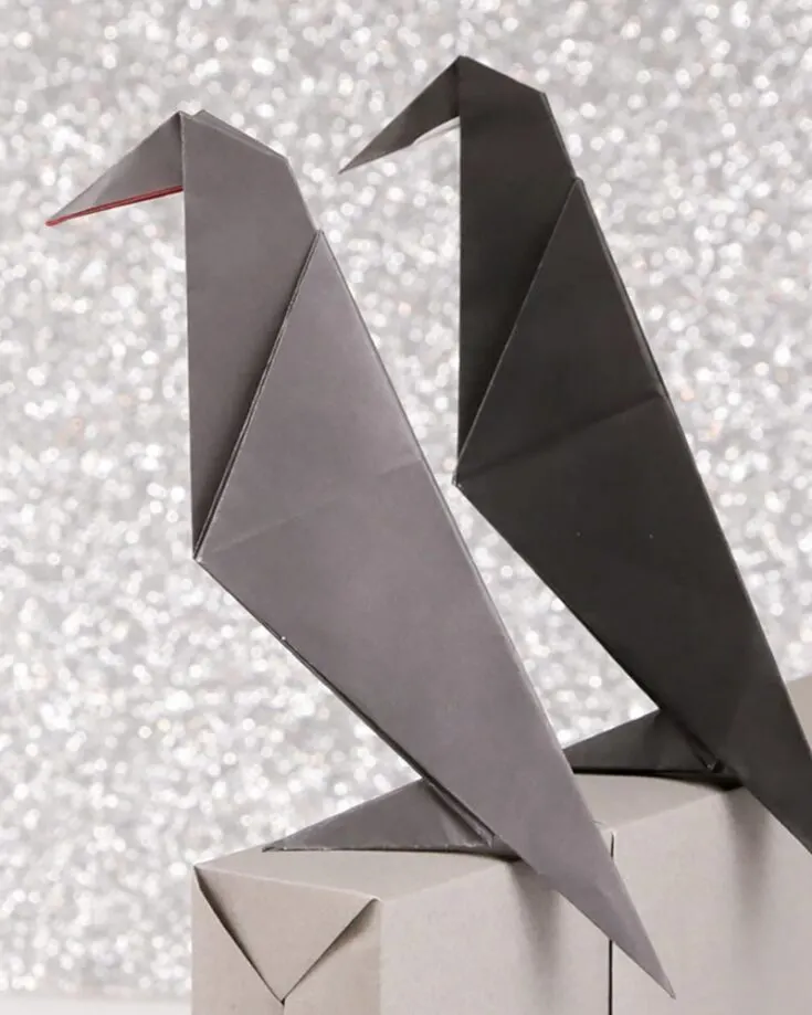 Have fun crafting away with this delightful origami crow! This guide is easy and enjoyable for everyone. Follow along, and you'll soon have a charming origami bird to brighten up your space.