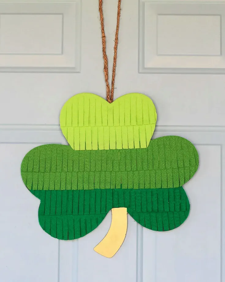 Finally, this amazing design for an ombre fringe wreath. These are super easy to make, fast, and it is mostly made from paper. Try out this craft with your kids to create core memories with them.