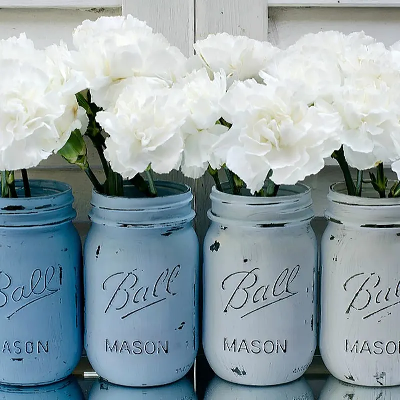 What is ombre you may ask? Its when you blend shades of one color hue into another usually moving light tints to dark tints. It gives a nice progression of color and design to your jars especially if you make multiple and line them up.