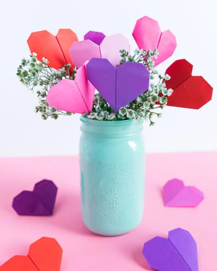 Now that you've walked through our origami heart instructions, why not upgrade your origami heart into a flower bouquet? This simple tutorial upgrades what we've taught you into a gorgeous decoration that can be given to your favorite person in the whole world.