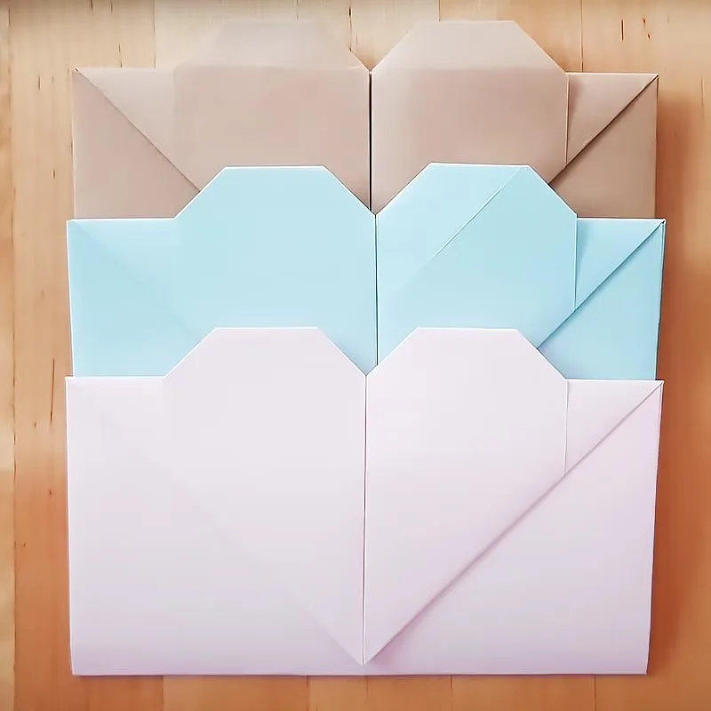 Want to send something to your loved ones far away? This tutorial shows you how to fold paper into a heart envelope that can carry your heartwarming message safely to them.