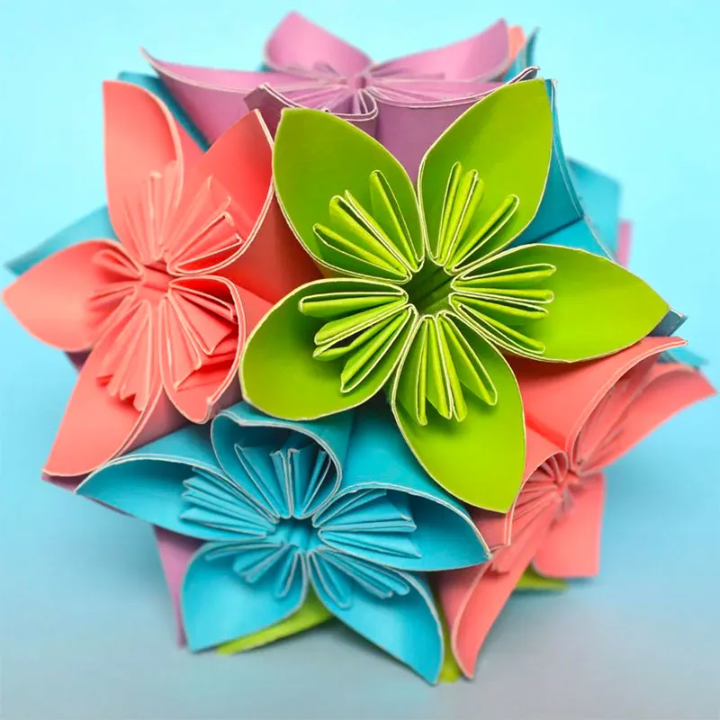 Once you have made several Kusudam flowers, assemble them into a beautiful Kusudama flower ball. Decorating with this origami flower ball is perfect for any occasion that has a floral theme.