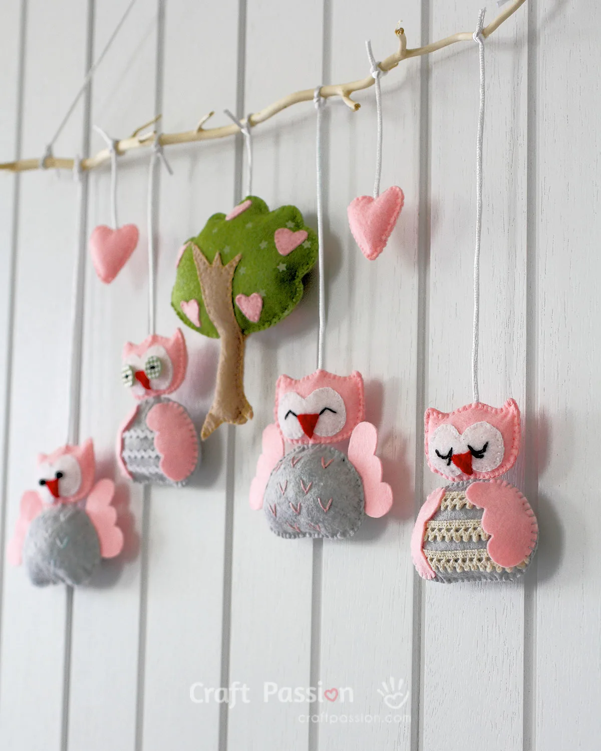 Create an adorable DIY baby mobile with our free sewing pattern featuring cute owl characters & a lovely tree design. Perfect nursery decor & baby shower gift!