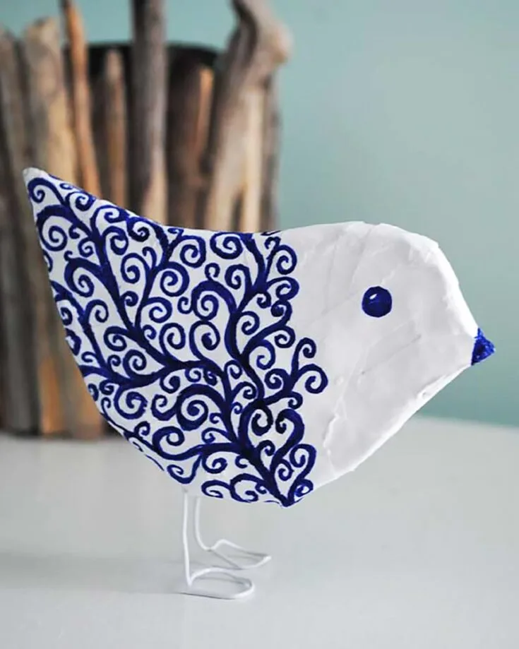 This lovely and delicate paper mache bird would look wonderful perched on your mantlepiece. Draw and color the bird in any way you like!&nbsp; Even a child could attempt to make it because it does not require a lot of skill.