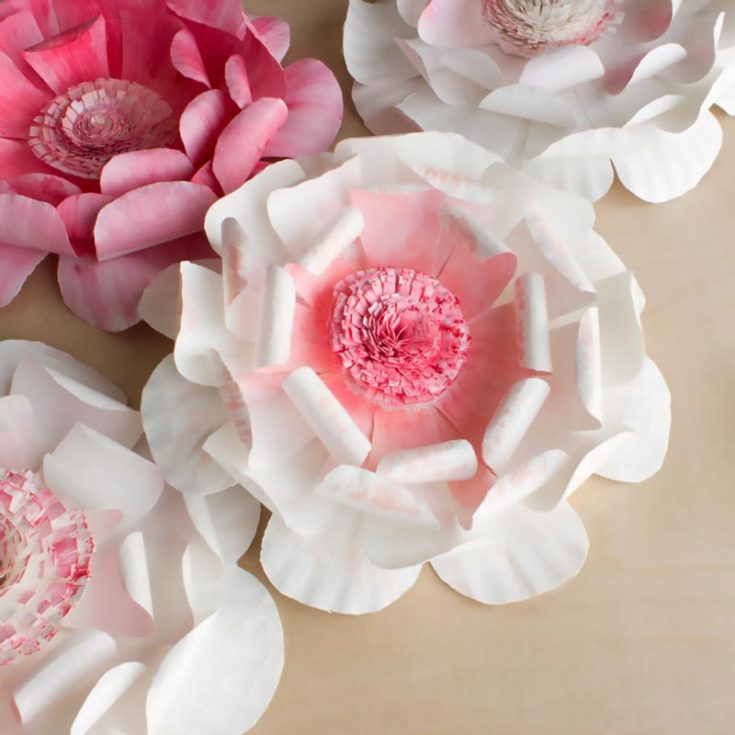 Who knew you could make flowers that look so realistic by using paper plates? We bet your friends and family will be shocked to find out that a paper flower is under that layer of paint.