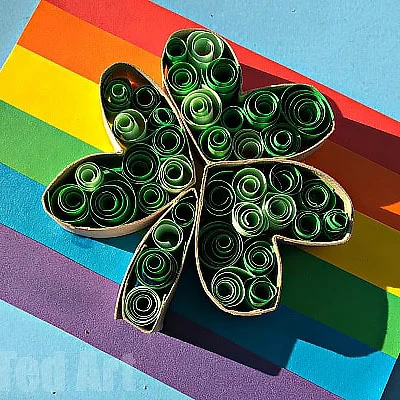Try out this easy-to-make craft that is made from paper and toilet paper rolls! With just some paint, glue, and scissors, you too can make your very own paper-quilled shamrock cards.