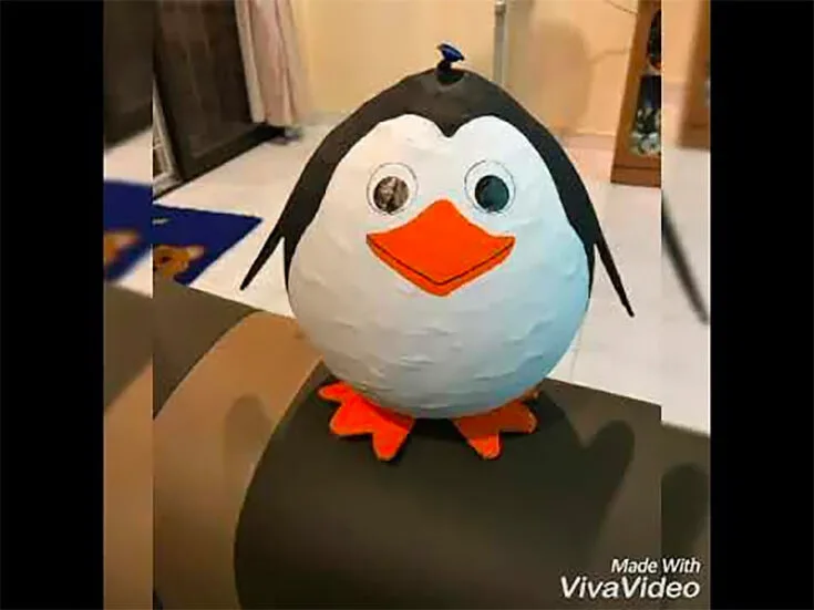 Kids can make a cute paper mache penguin with this easy and fun craft project. It's perfect for a creative afternoon at home or for school.