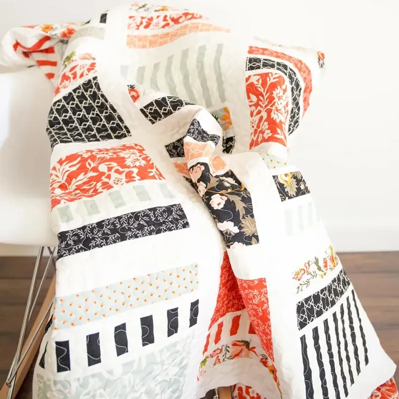 For those of you who prefer a minimalistic look with a clean background for your quilts, this Peaches and Cream quilt is just what you&rsquo;ll need. This 62&rdquo; x 62&rdquo; quilt design is so soft to the touch, and the peachy hues and creamy whites are also visually pleasing to the eyes! It&rsquo;s an excellent project for beginners and seasoned quilters to try, and it offers easy-to-follow instructions to help guide you.
