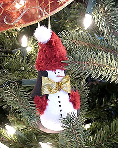 Get the beautiful DIY Light Bulb Christmas Ornaments tutorial here to make this penguin ornament for the Christmas Tree.
