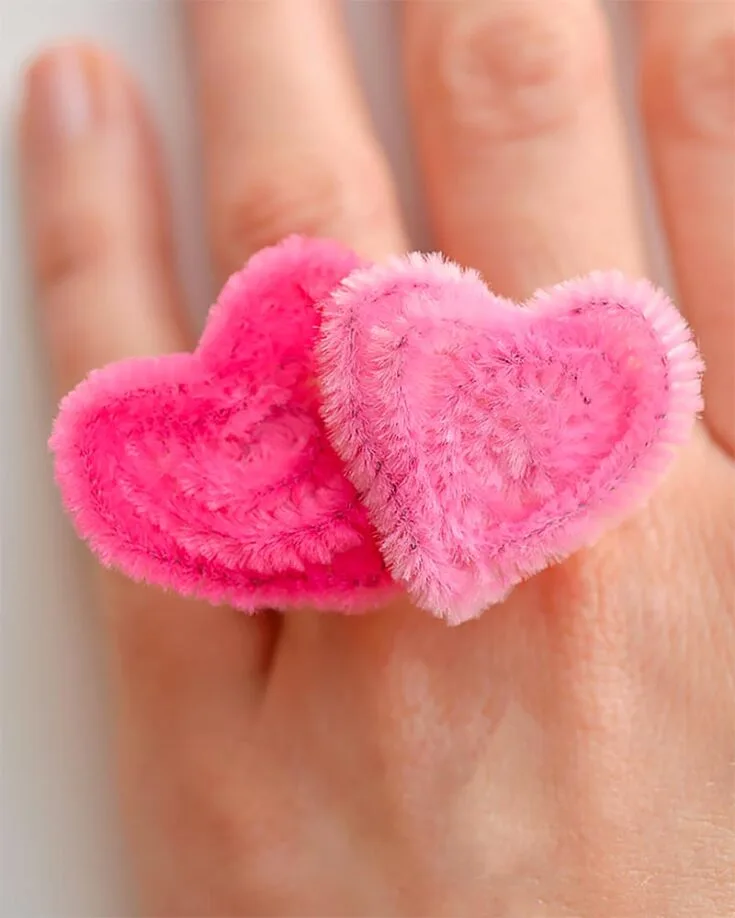 A fun way to create accessories with your kids would be to make cute heart rings from pipe cleaners! It's a great Valentine's Day craft for kids and a great bonding activity.